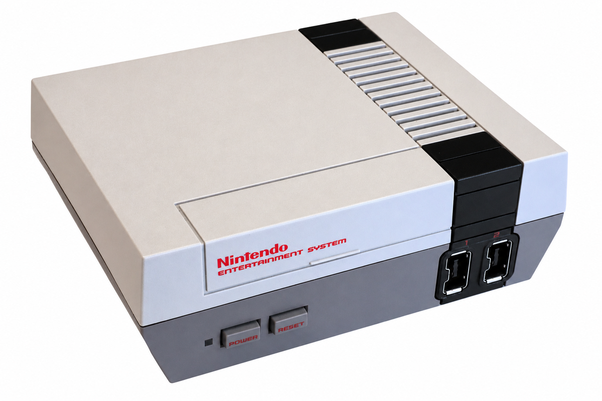 Nintendo Entertainment System console in its classic cream, gray, and black color scheme, photographed on a clean white background.